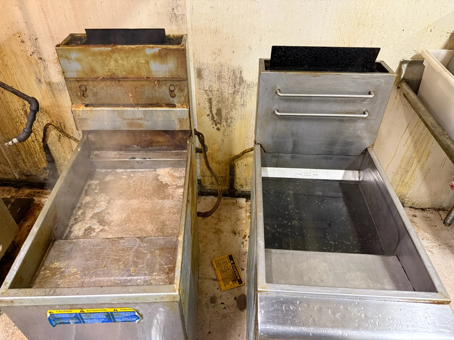 Cooking equipment at different stages of cleaning