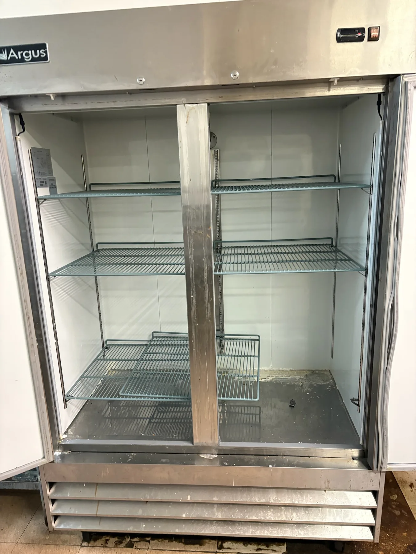 Empty commercial refrigerator interior