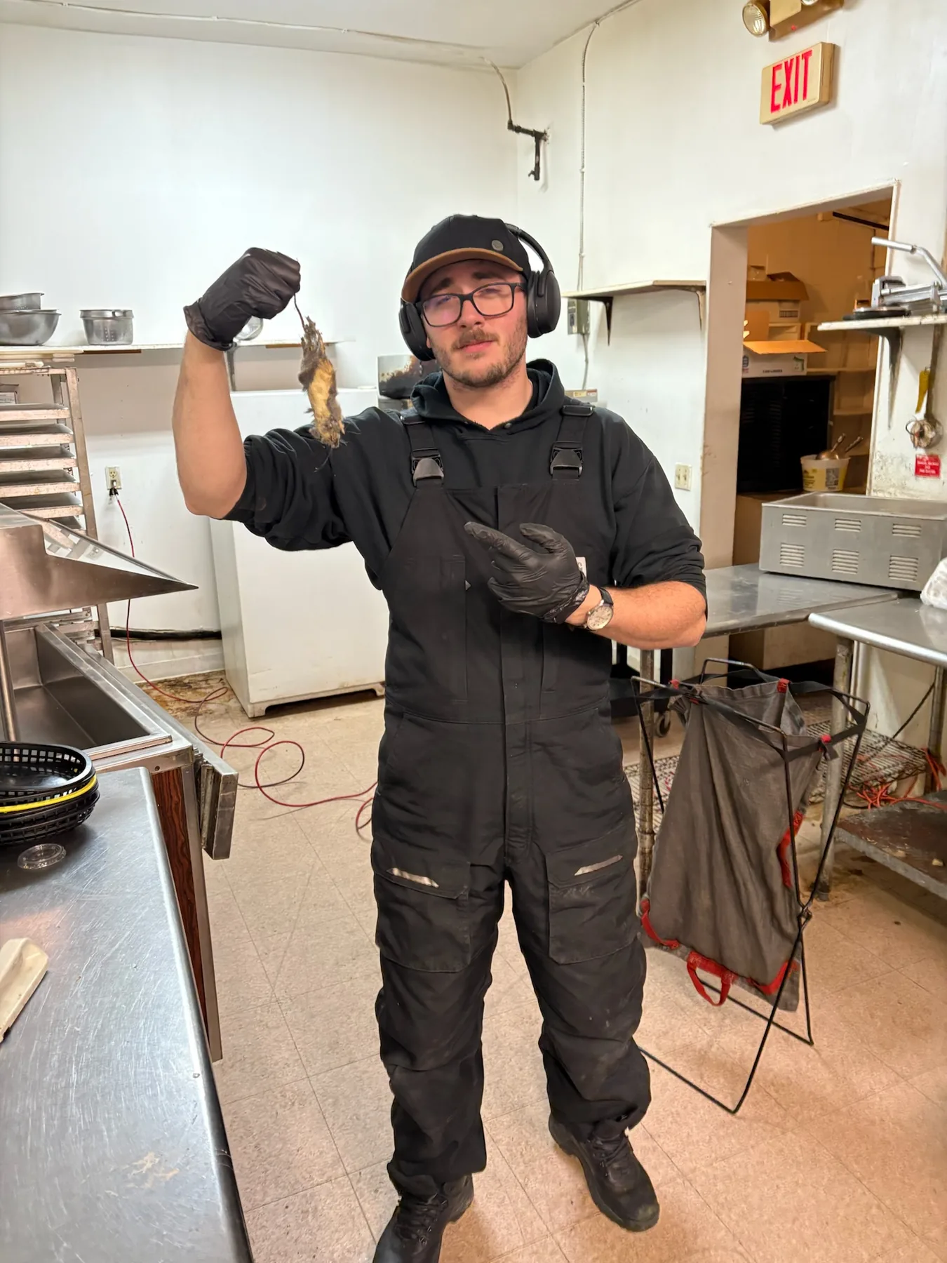 SaniDine crew member on a kitchen cleaning job